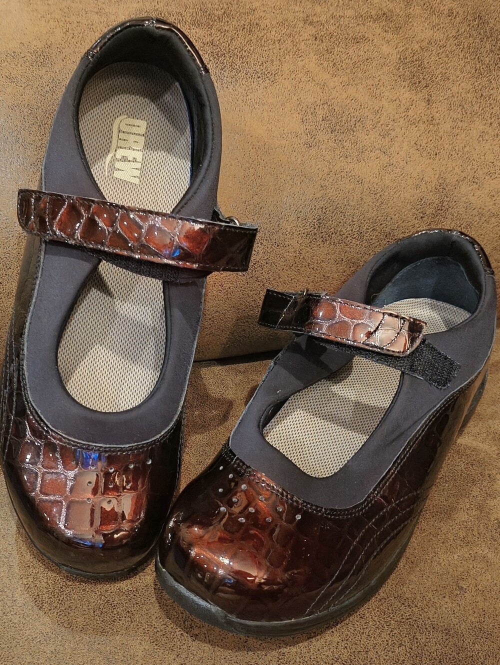 DREW Dark Brown Croc-Embossed Patent Mary Jane Flats